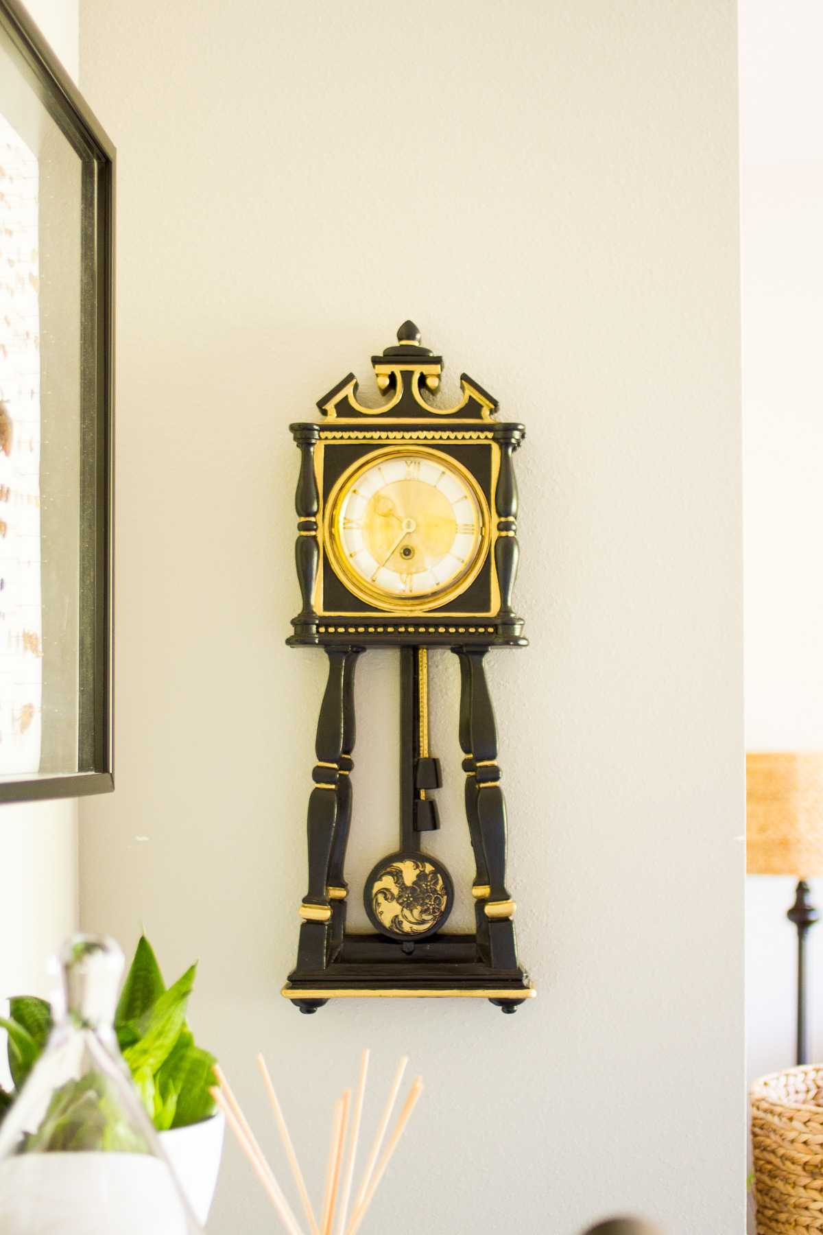 handpainted black and gold plaster clock