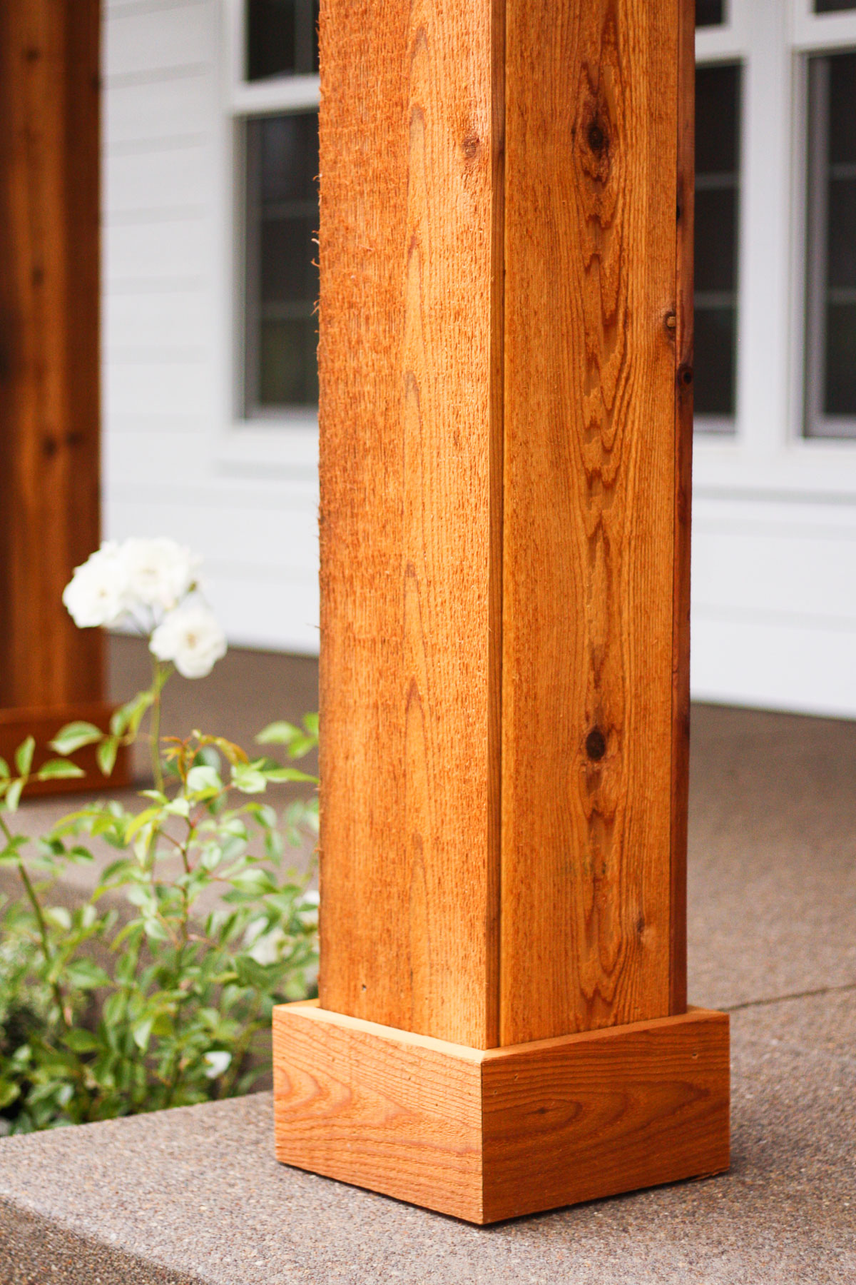 We turned the plain white front porch pillars into cedar pillars, and our porch has never looked better.