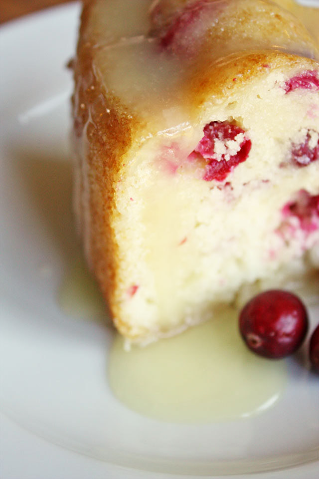 This fresh cranberry cake is beautiful and delicious, a unique dessert to serve during the holidays. Don't skimp on the hot butter sauce: it's the best part!