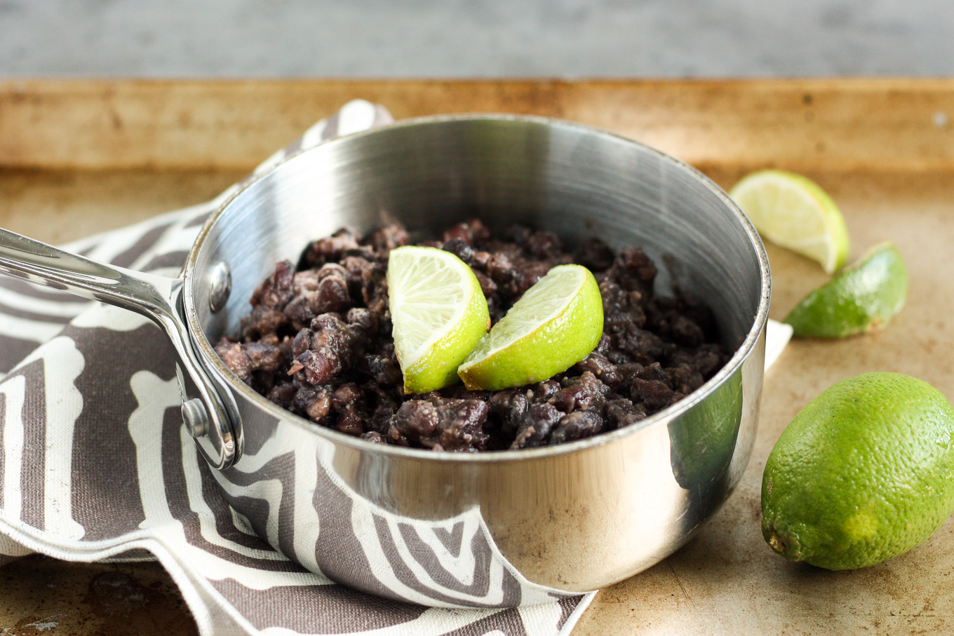 Easy seasoned black beans are the perfect side dish for all of your favorite mexican foods.