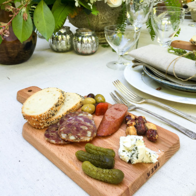 Use small cutting boards to create mini charcuterie boards or cheese plates for a casual-chic gathering.
