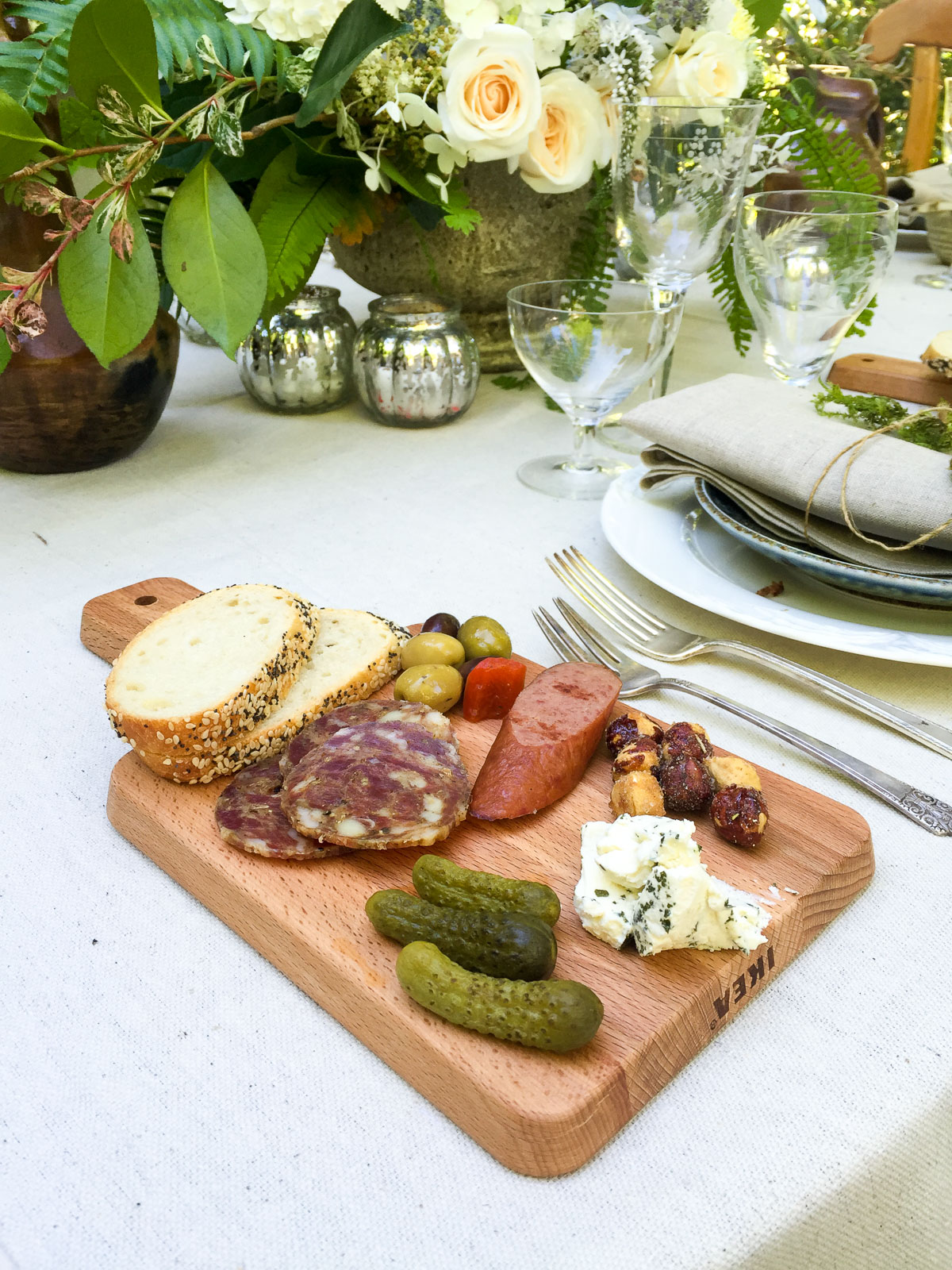 Use small cutting boards to create mini charcuterie boards or cheese plates for a casual-chic gathering.