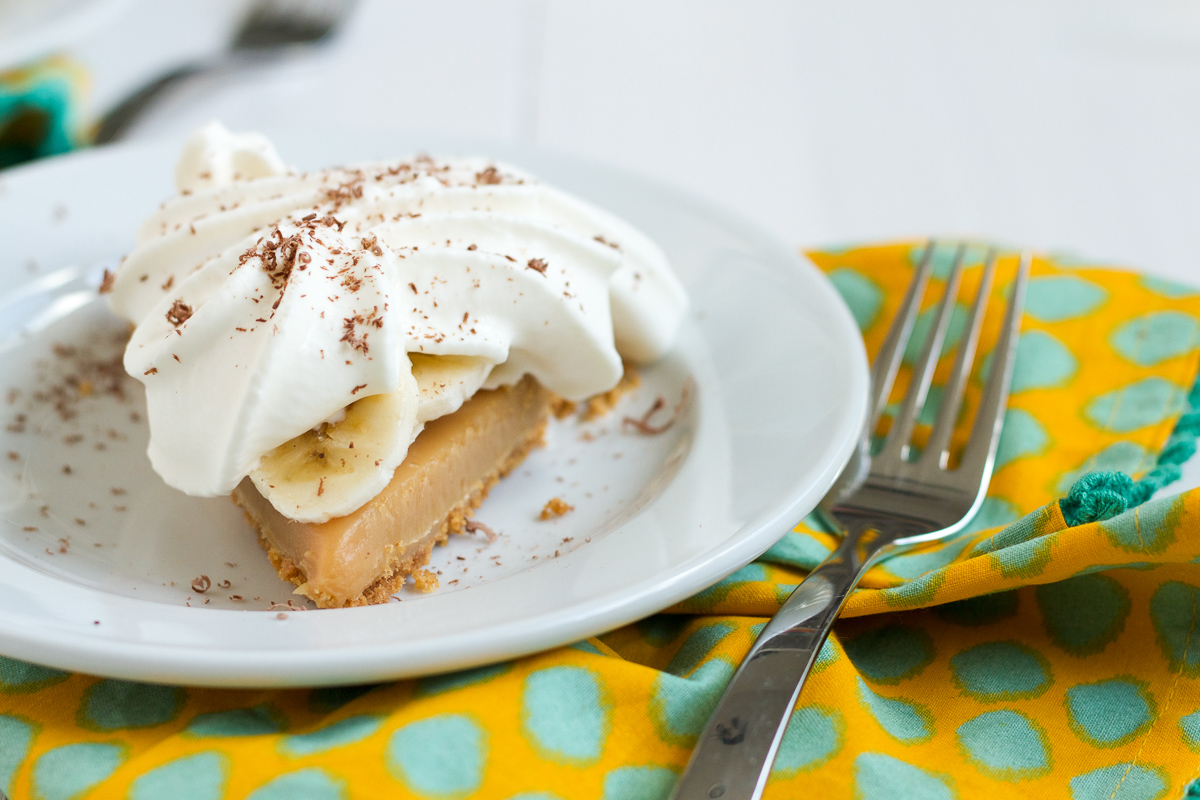 Banoffee Pie starts with a buttery, graham cracker crust filled with an easy-to-make, sticky stove top caramel. Add some banana slices and a pile of whipped cream, and you've got yourself one amazing dessert!