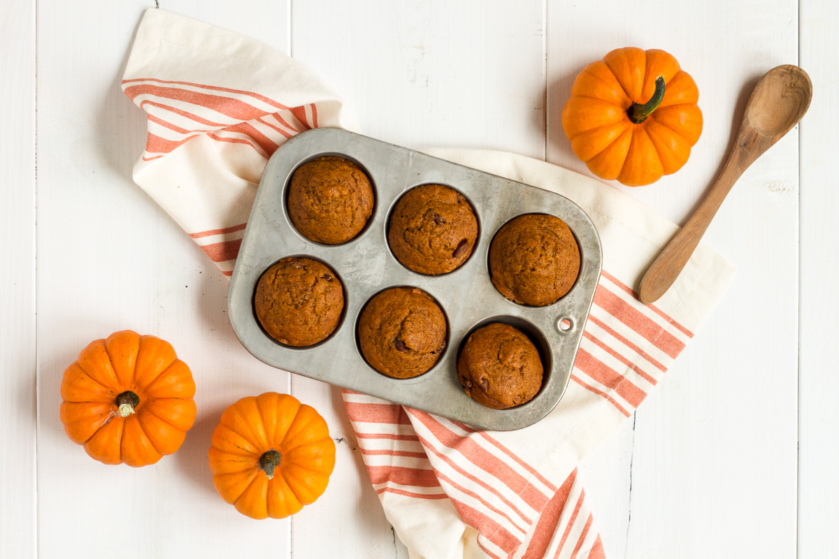 Bake up a batch of these delicious pumpkin chocolate chip muffins today!