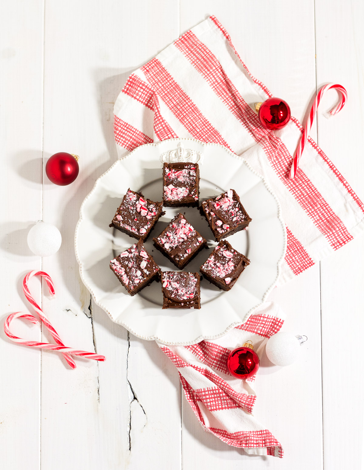 Thanks to a dressed up box mix, these peppermint fudge brownies are rich, delicious, and easy to make!