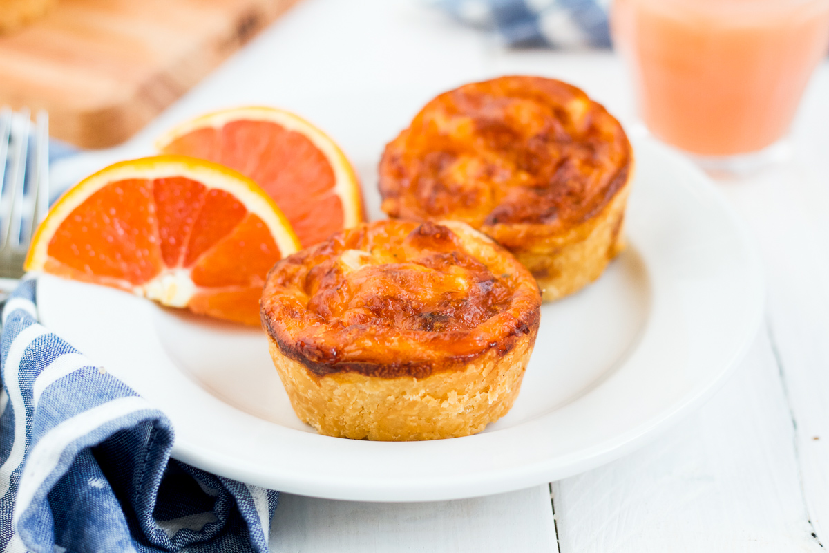 These mini quiche feature a delicious filling of cheddar, bacon, onions, and savory eggs in an amazing cream cheese pastry crust!