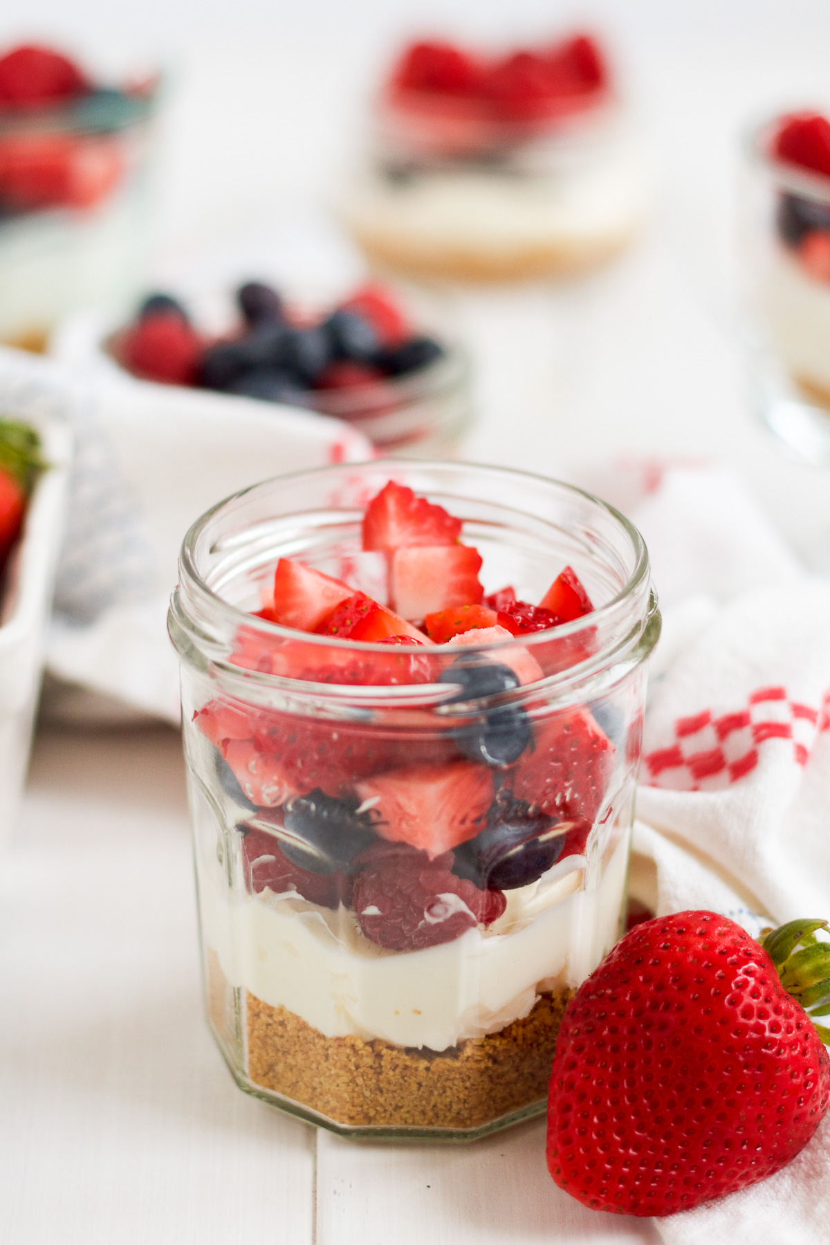 These easy no-bake cheesecakes can be topped with fresh berries in the summer, or silky lemon curd in the winter!