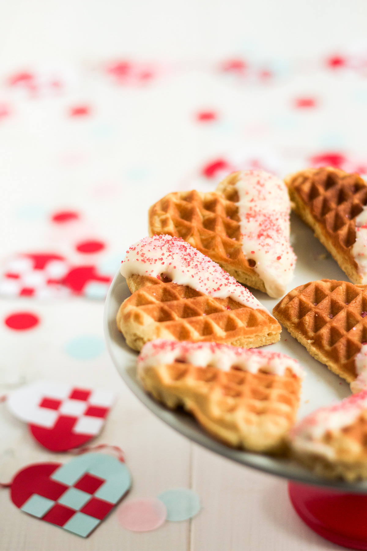 Heart-shaped waffle cookies dipped in white chocolate