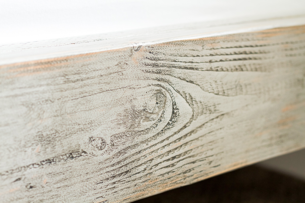 Find out how to use chalk paint and wax to make new wood look rustic and weathered.