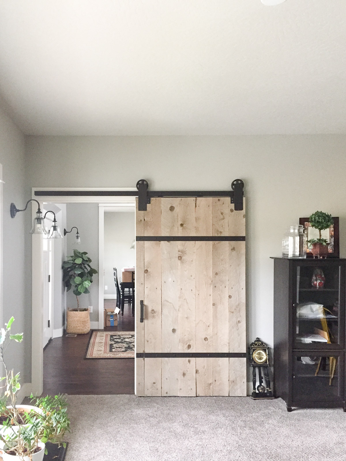 Thanks to the One Room Challenge, this disorganized living room will get a beautiful makeover! We're going for a lush, green, naturalist vibe.