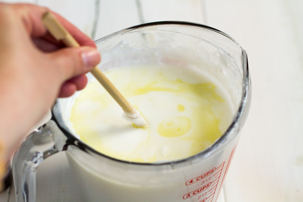 Adding essentials oils to homemade soap.