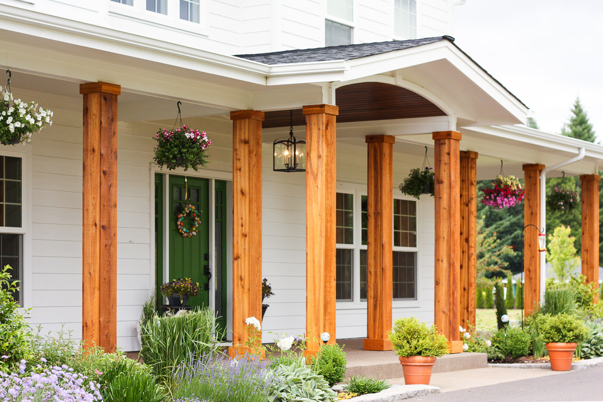 We turned the plain white front porch pillars into cedar pillars, and our porch has never looked better.