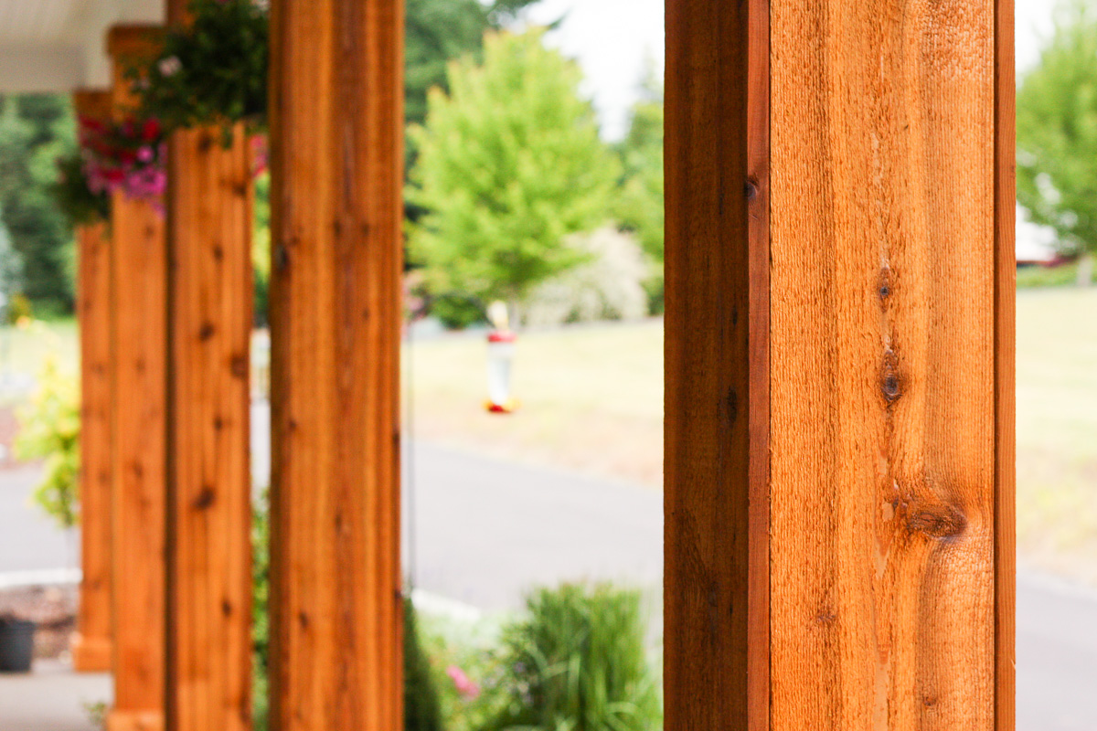 We turned the plain white front porch pillars into cedar pillars, and our porch has never looked better.