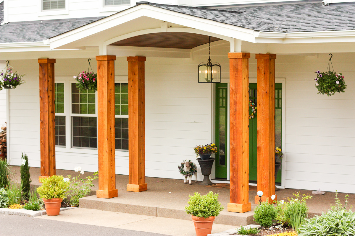 We turned the plain white front porch pillars into cedar pillars, and our porch has never looked better.