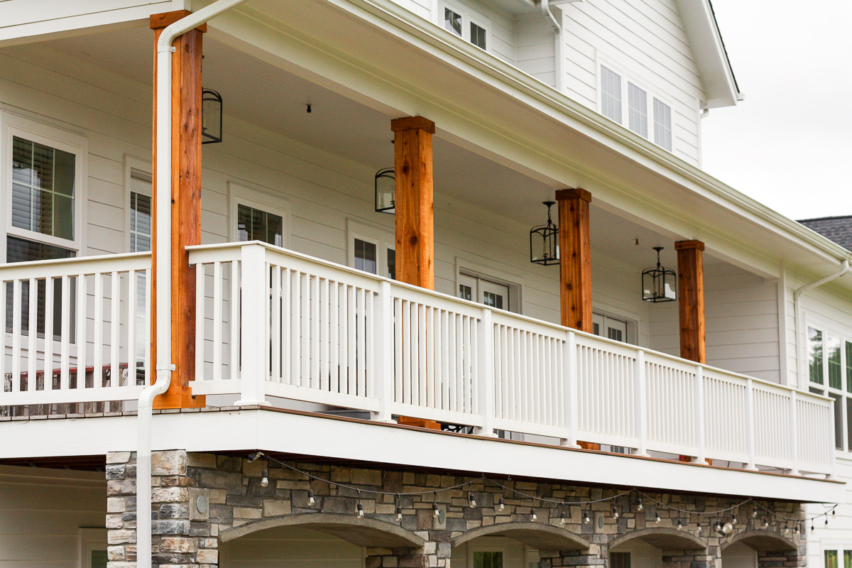 We turned the plain white front porch pillars into cedar pillars, and our porch has never looked better.