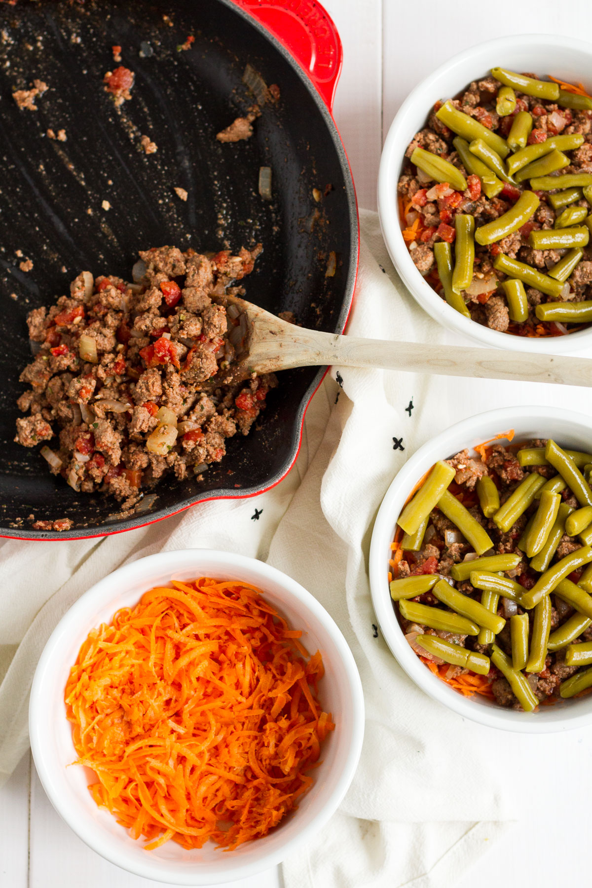 Shepherd's pie is one of my family's favorite easy dinners. These individual italian-style shepherd's pies have a delicious filling with herbs and tomatoes, and a sprinkling of parmesan cheese on top.