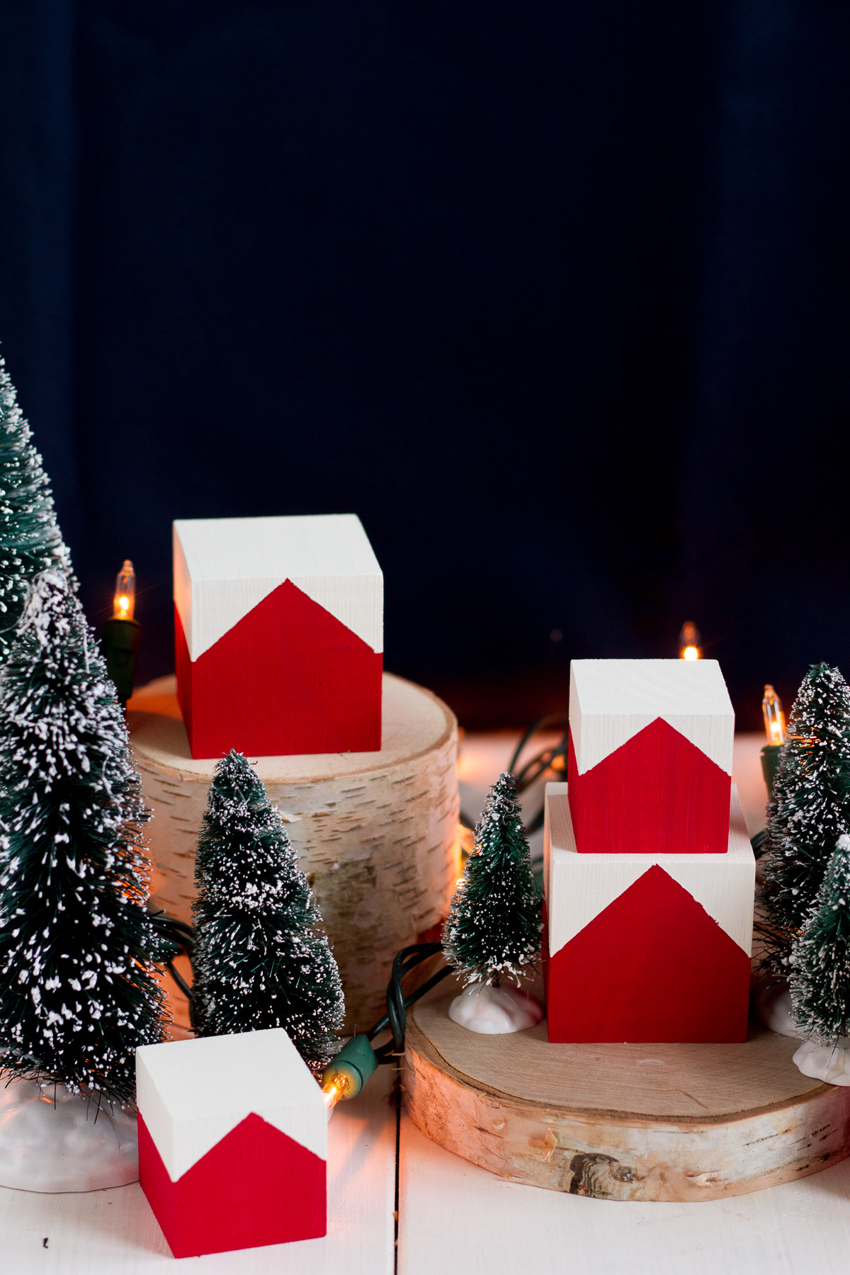 These cute and easy DIY Norwegian Christmas House blocks are inspired by the red and white houses tucked into the hillsides of fjord country.