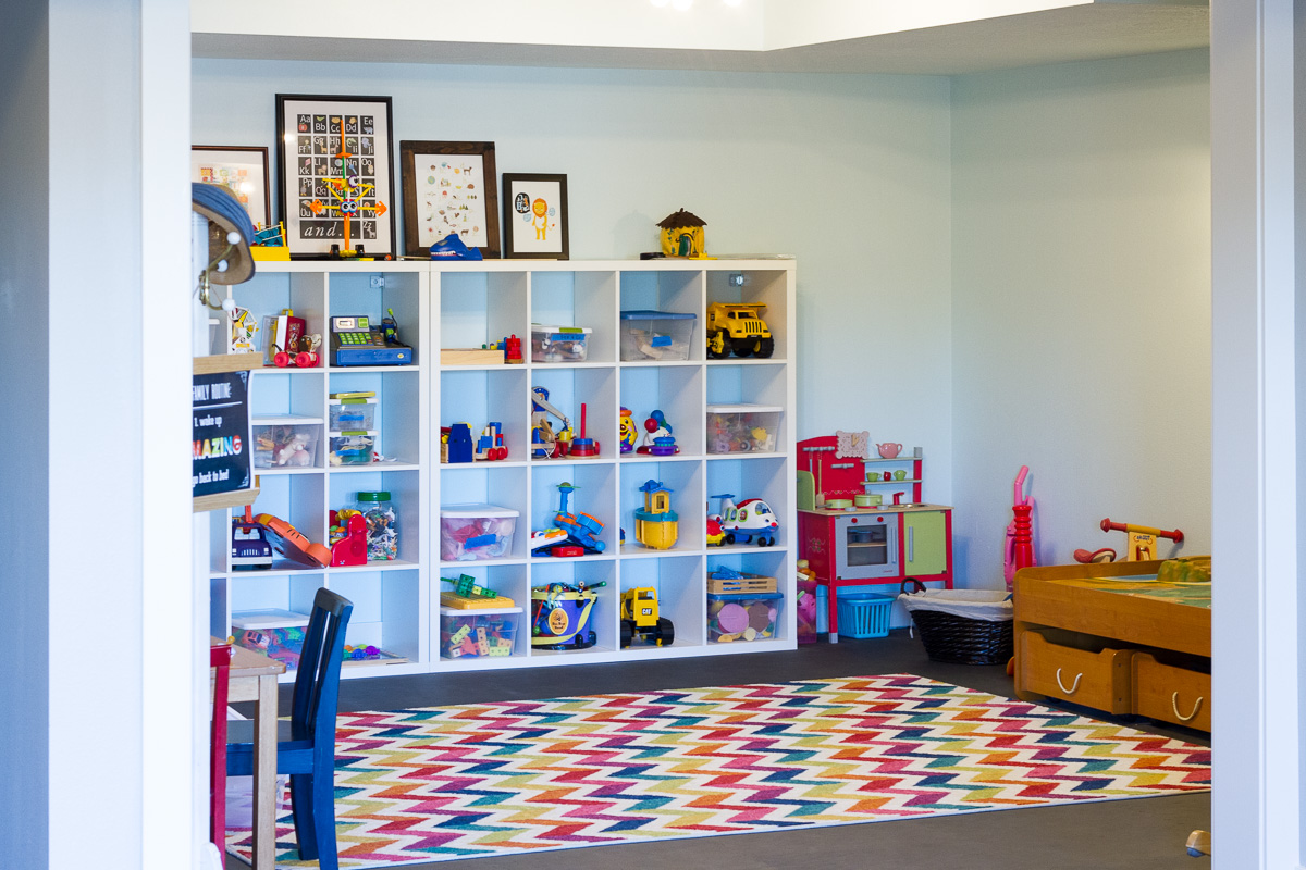 We cleaned and reorganized our playroom over the holidays, thanks to the Dymo Letratag label maker. Two weeks in and the room is still spotless!