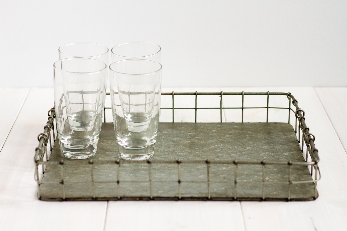 Don't have the room for a big bar cart? Put together a cute, easy, inexpensive DIY drink station for your next party!