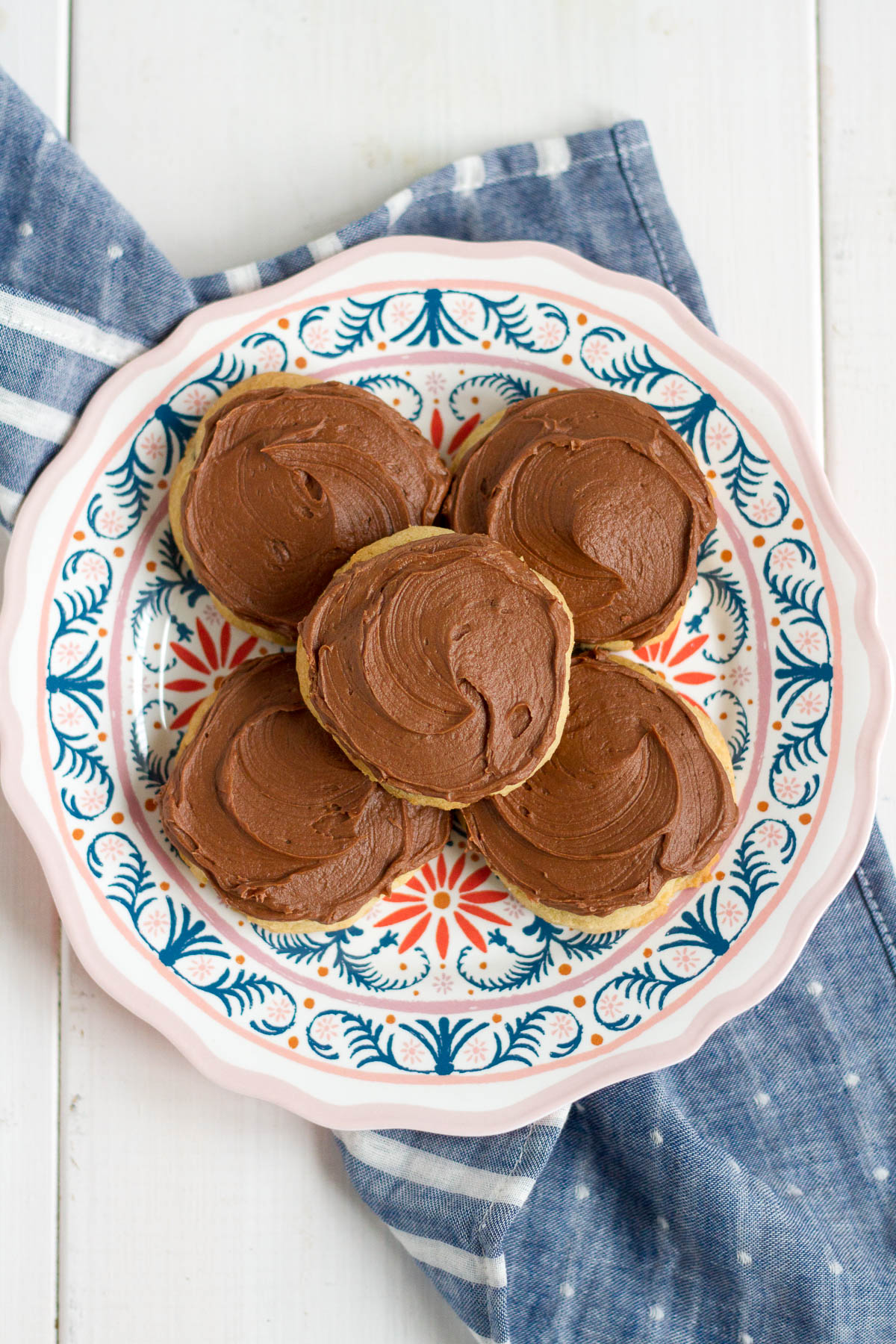 I took our favorite chocolate chip cookie recipe and topped it with our favorite chocolate frosting, and the results are a decadent new favorite!