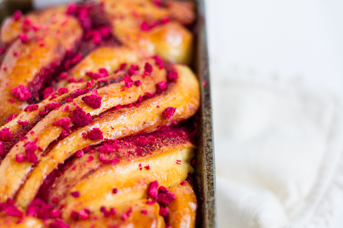 A classic brioche dough with raspberry swirled throughout, topped with a sticky sugar syrup and crushed, freeze-dried raspberries