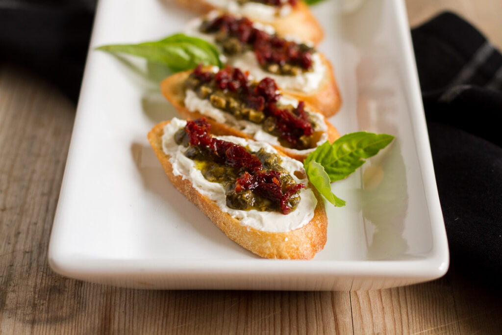 sundried tomato pesto crostini are perfect for the holidays